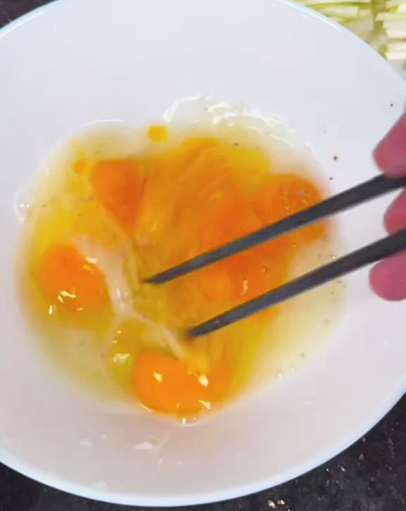 Use chopsticks to quickly stir
