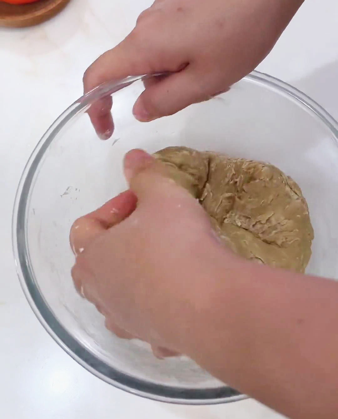 use your hands to knead the dough in the bowl until no dry flour remains