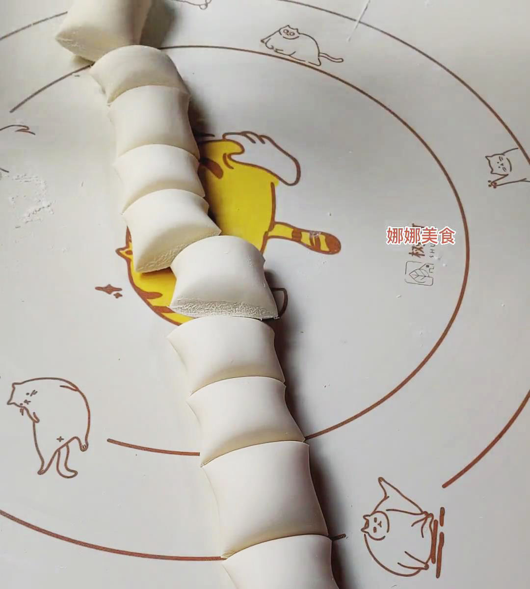 Divide the dough into 12 equal portions