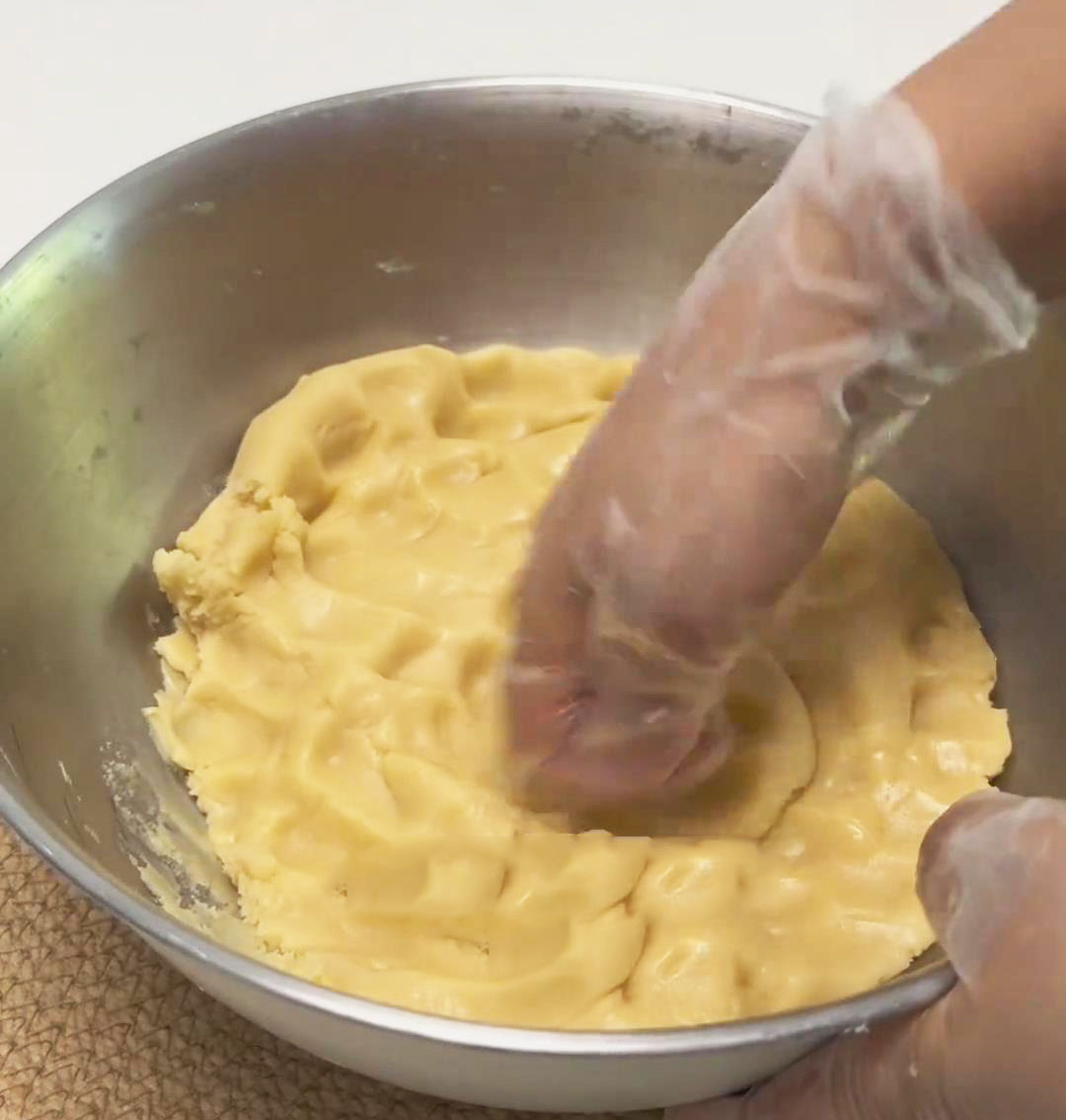 Knead the dough with your hand