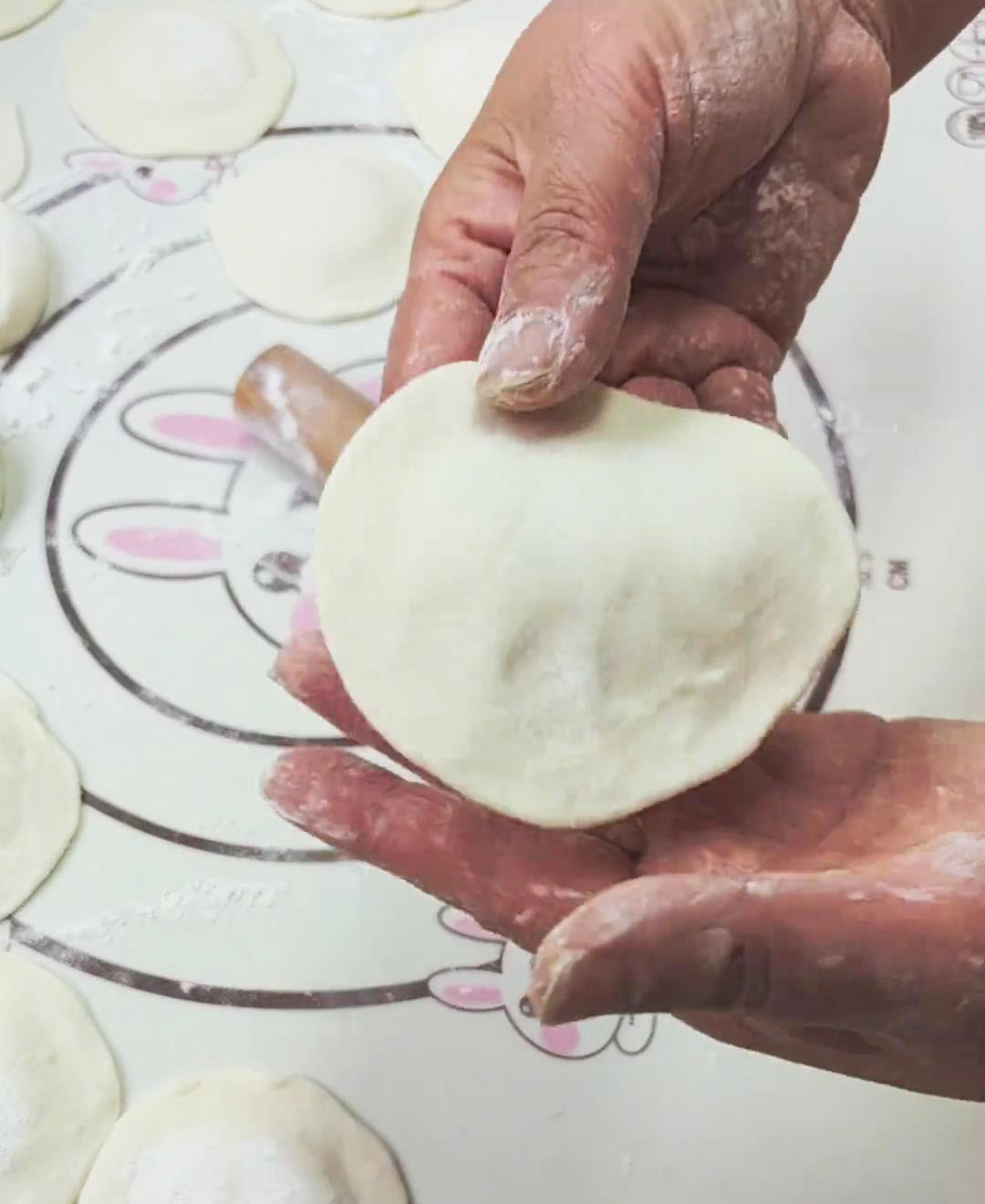 Roll each piece into a round wrapper with a thick center and thin edges