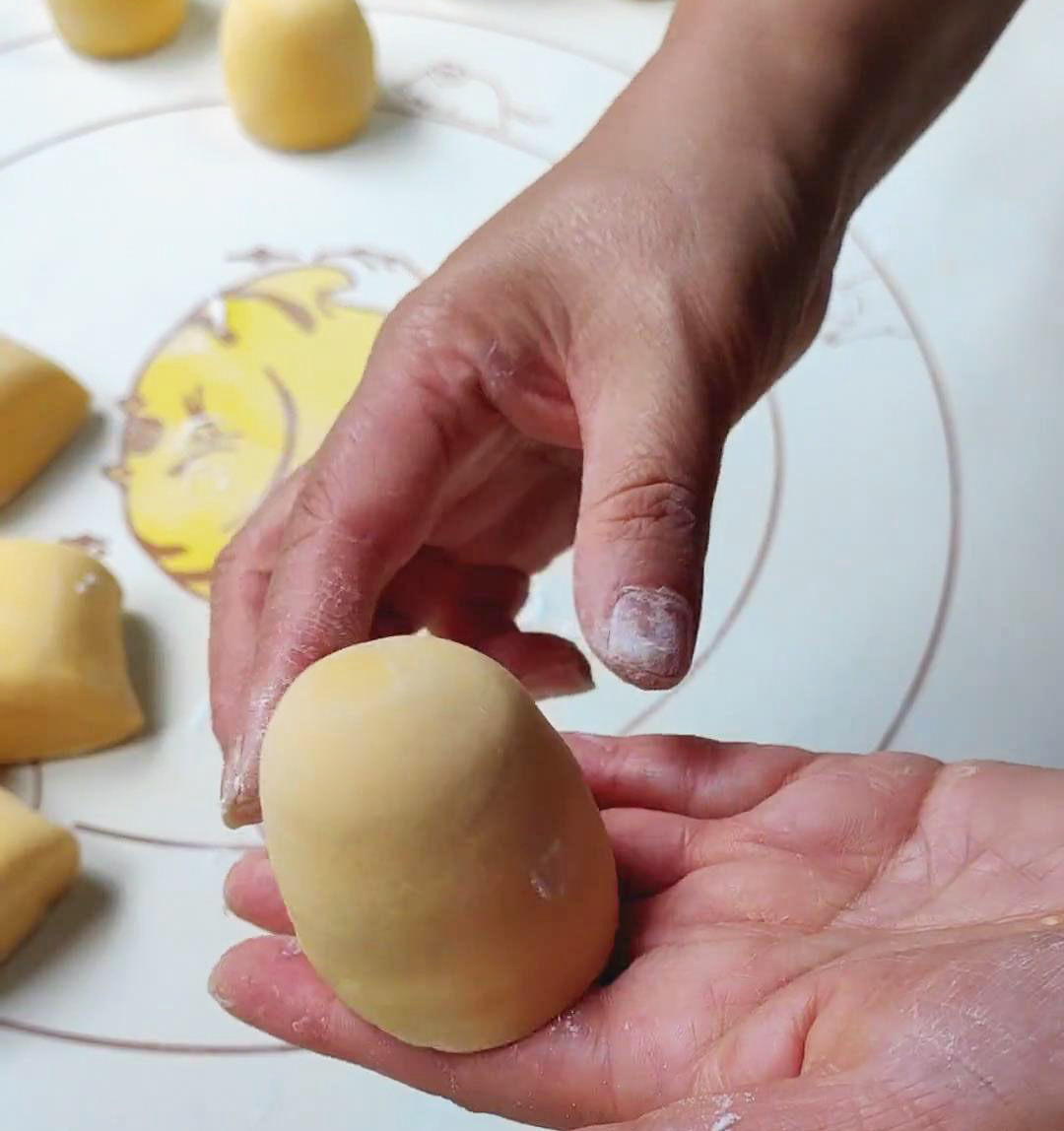 roll the balls slightly taller to form the classic mantou shape