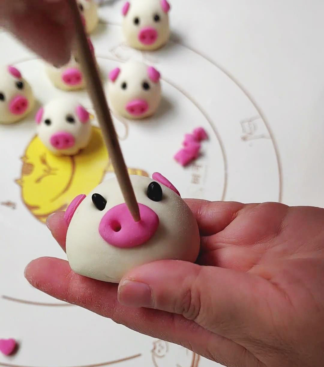 use a bamboo skewer to poke two nostrils in the snout