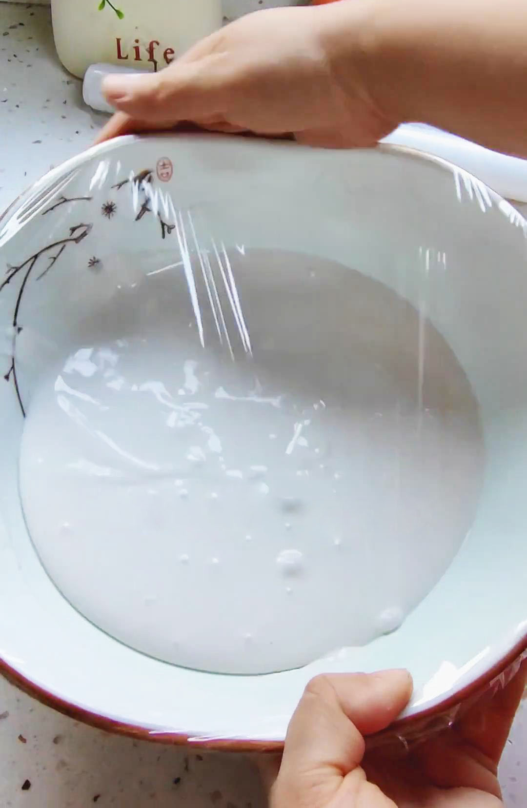 Cover the bowl with plastic wrap and place it in a warm area to rise