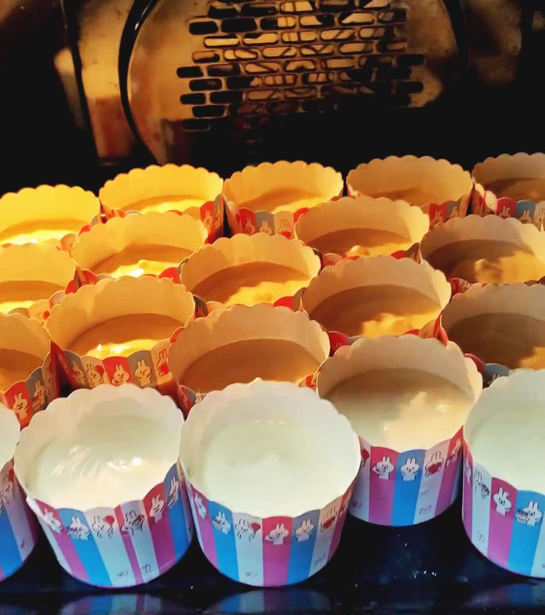 Place the cupcake liners in the preheated oven