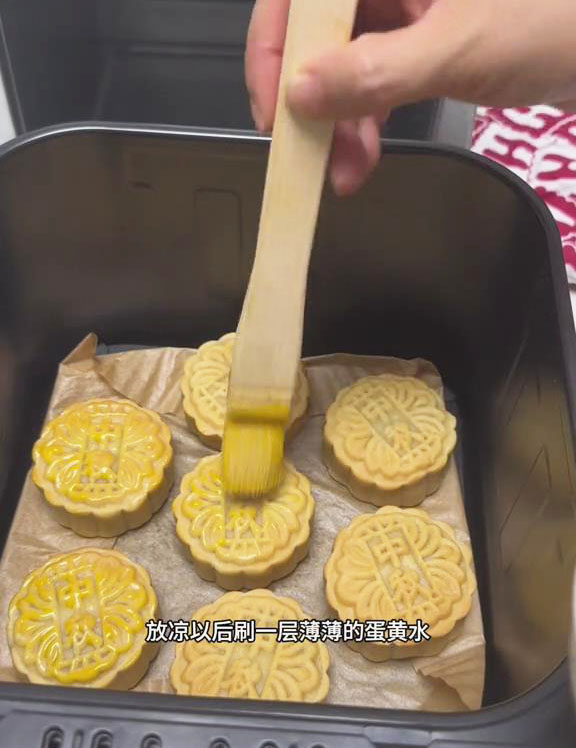 brush a thin layer of egg wash over the tops