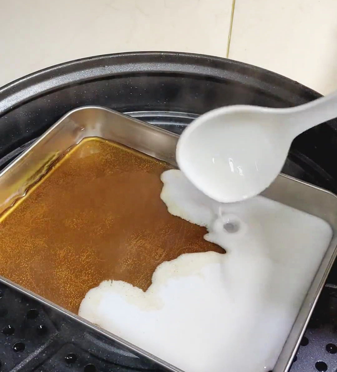 pour a small amount of the coconut milk mixture over the brown sugar layer pour a small amount of the coconut milk mixture over the brown sugar layer