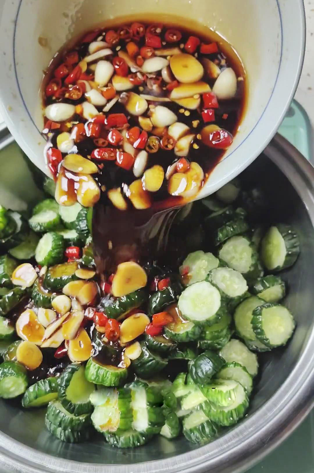 Pour the prepared sauce over the Cucumbers