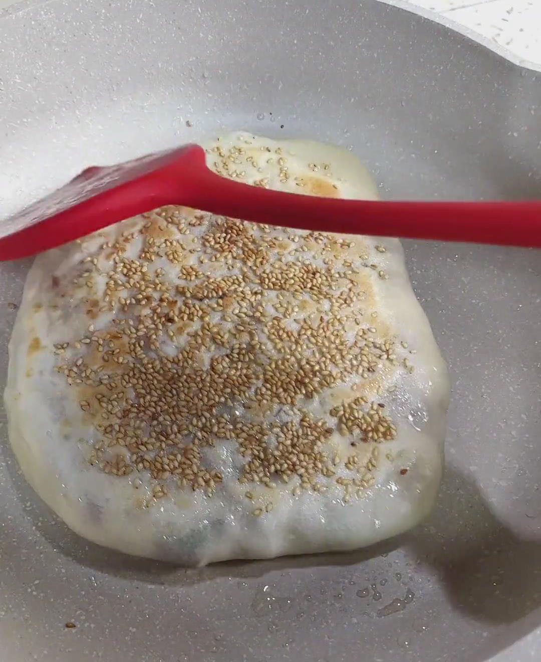 place the shaped shao bing into the skillet