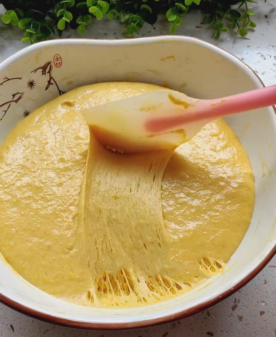 Uncover the batter and stir it gently with chopsticks to release air bubbles Uncover the batter and stir it gently with chopsticks to release air bubbles