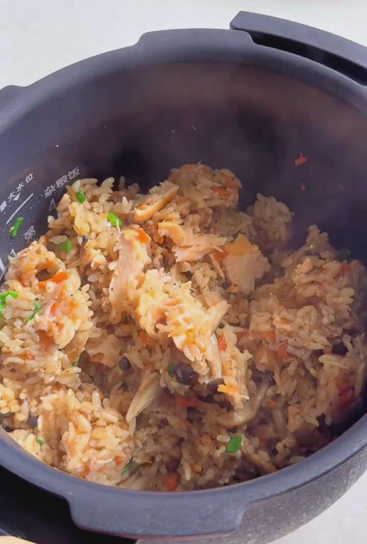 breaking up the salmon into smaller pieces