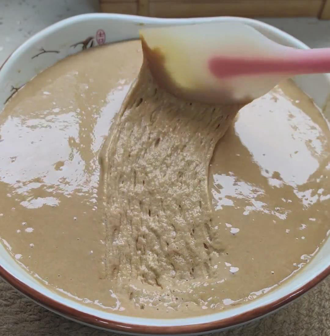 use a silicone spatula to gently deflate it