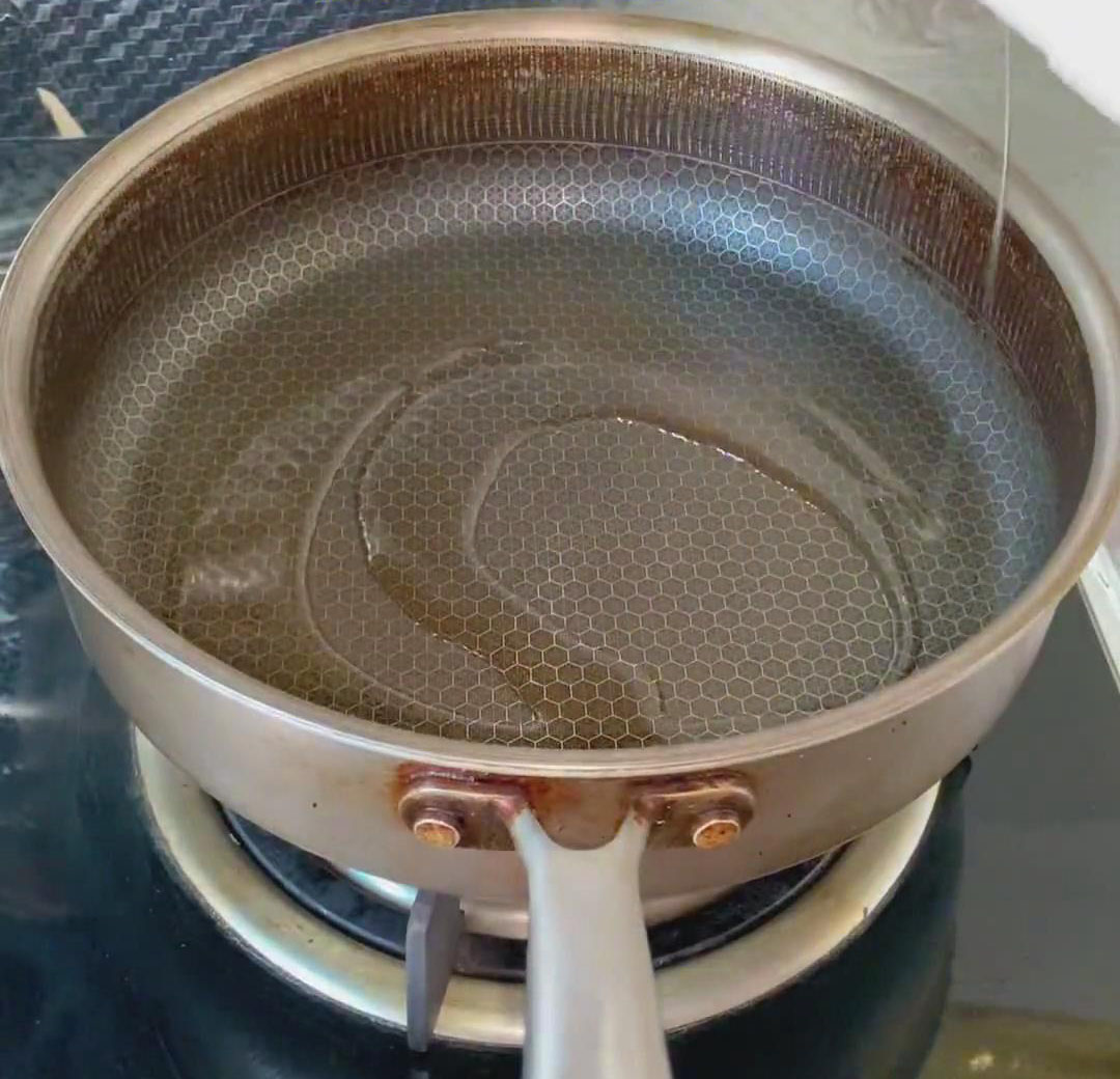 Add a small amount of cooking oil to the pan