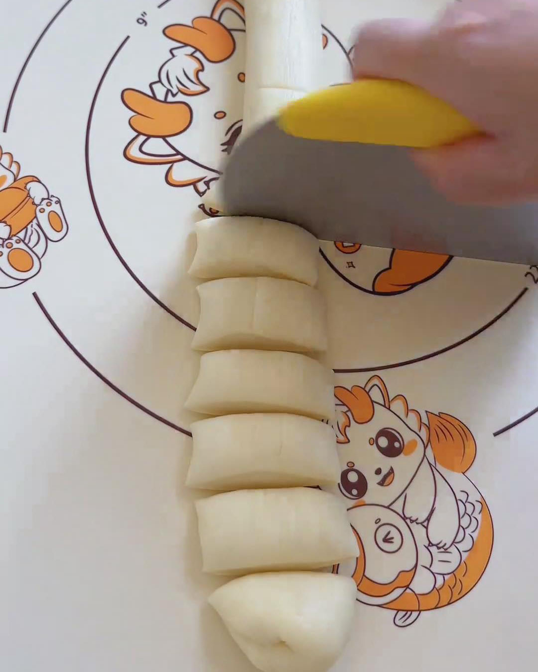 Roll it into a long log and divide it evenly into 20 portions