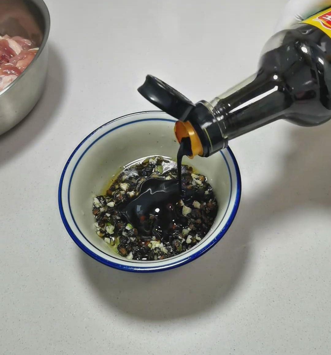 Add white pepper, light soy sauce, oyster sauce, and dark soy sauce