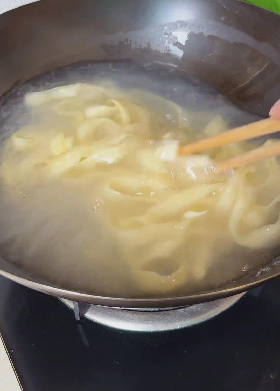 Add the noodles and stir to loosen