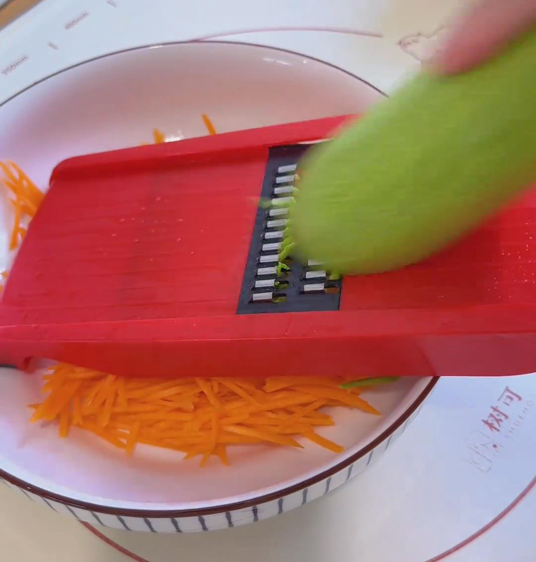 finely grate 1 carrot and 1 zucchini finely grate 1 carrot and 1 zucchini