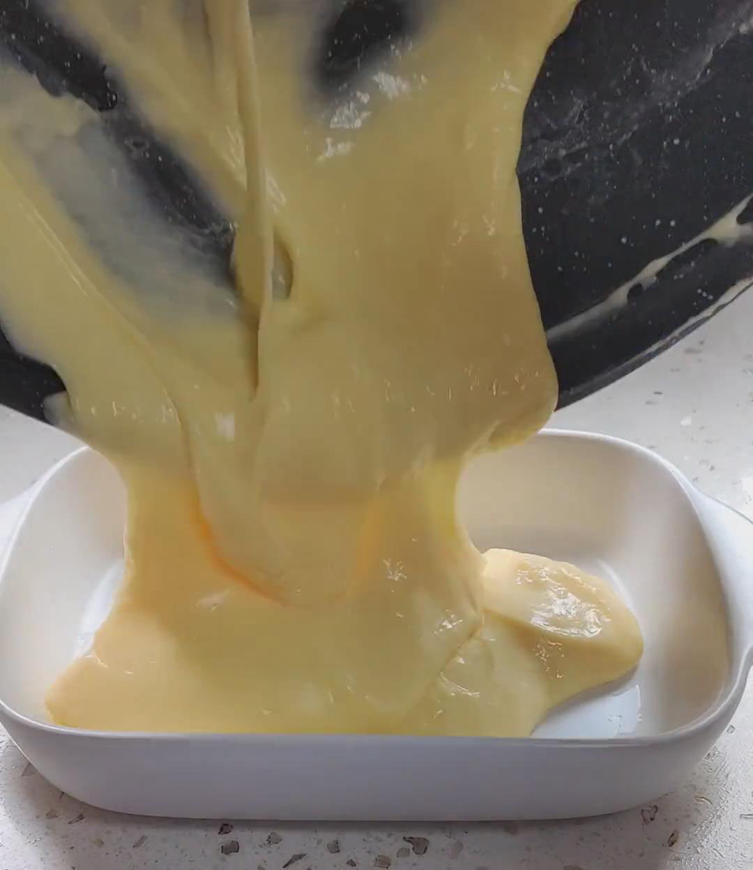 pour the mixture into a square mold