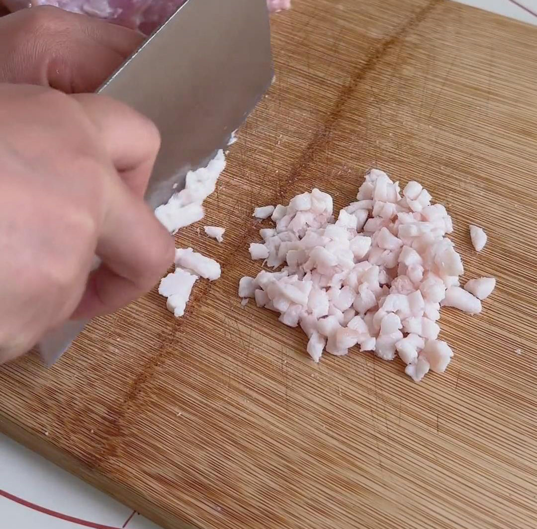 Dice fat into 0.5cm cubes Dice fat into 0.5cm cubes