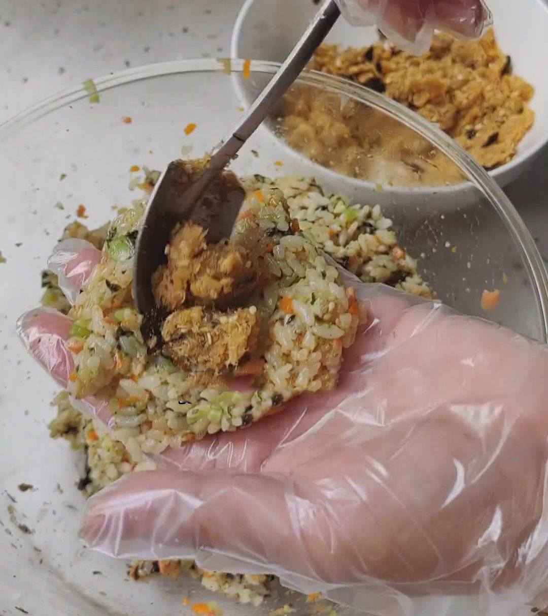 Place about 10 15g of the pork floss filling in the center