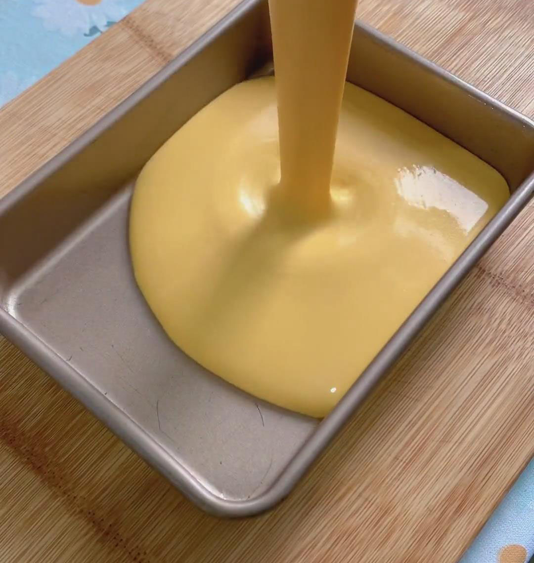 Pour the smooth batter into your prepared, oiled mold