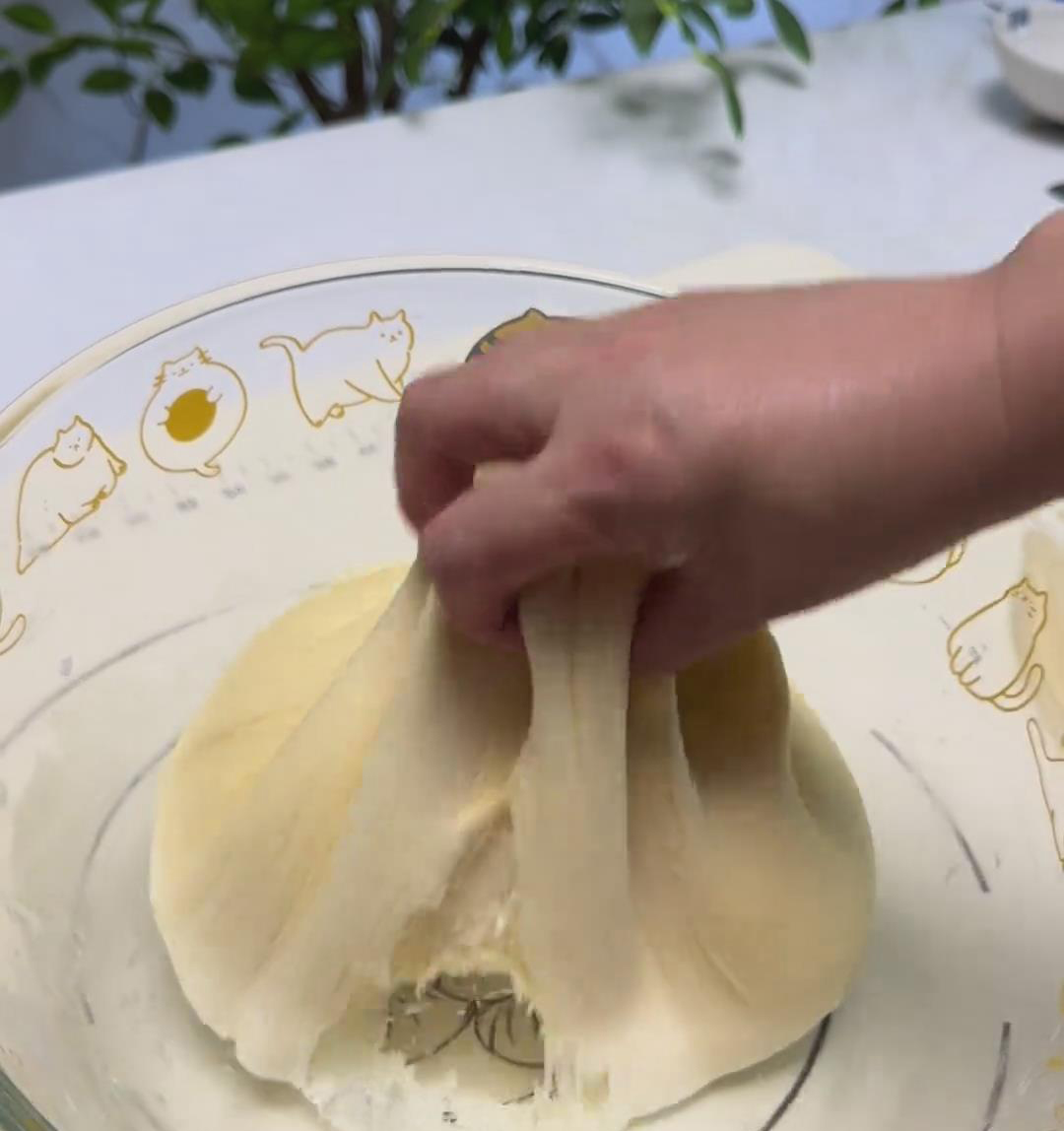 Gently press down the dough to release trapped air Gently press down the dough to release trapped air