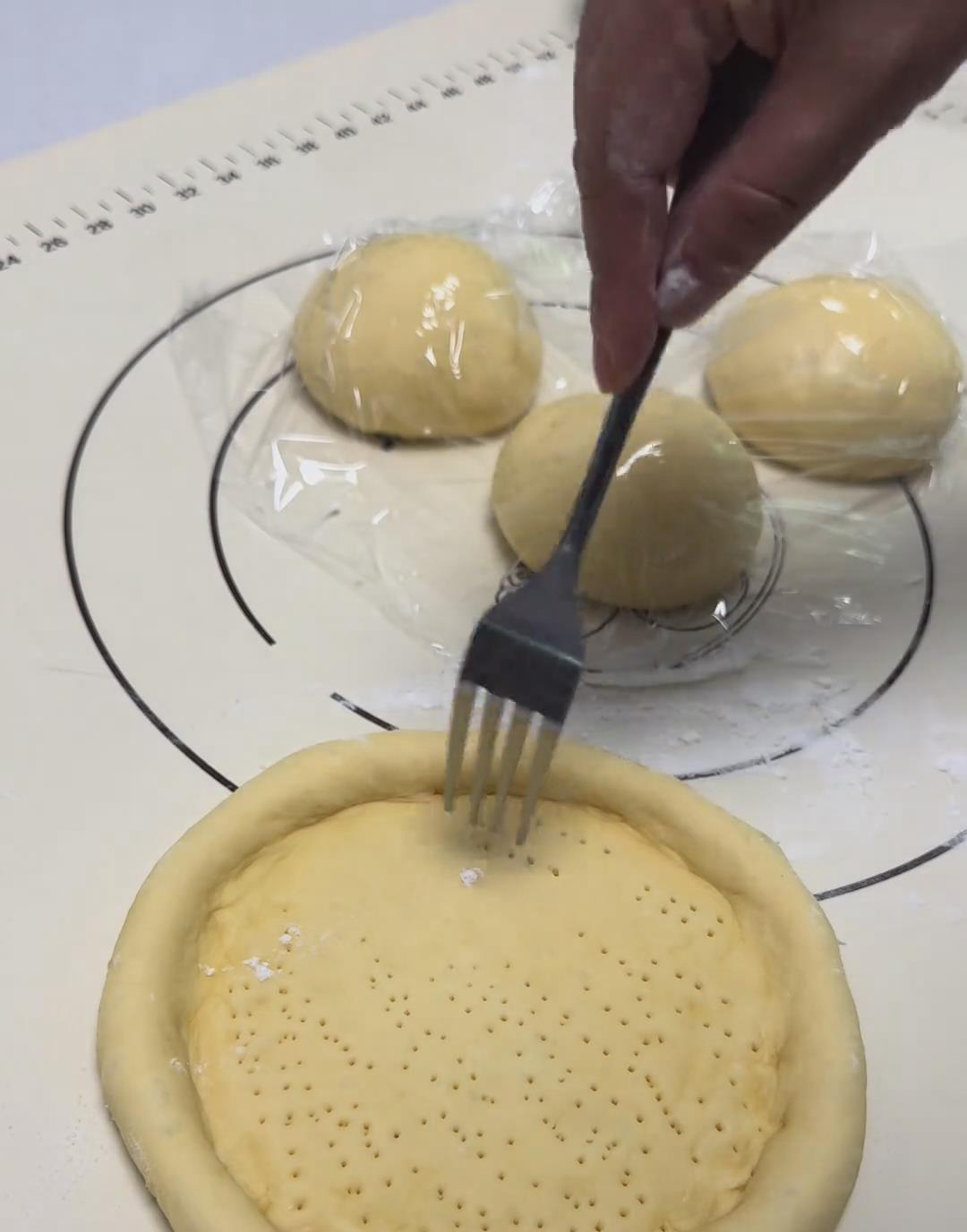 Use a fork to prick holes evenly across the surface Use a fork to prick holes evenly across the surface