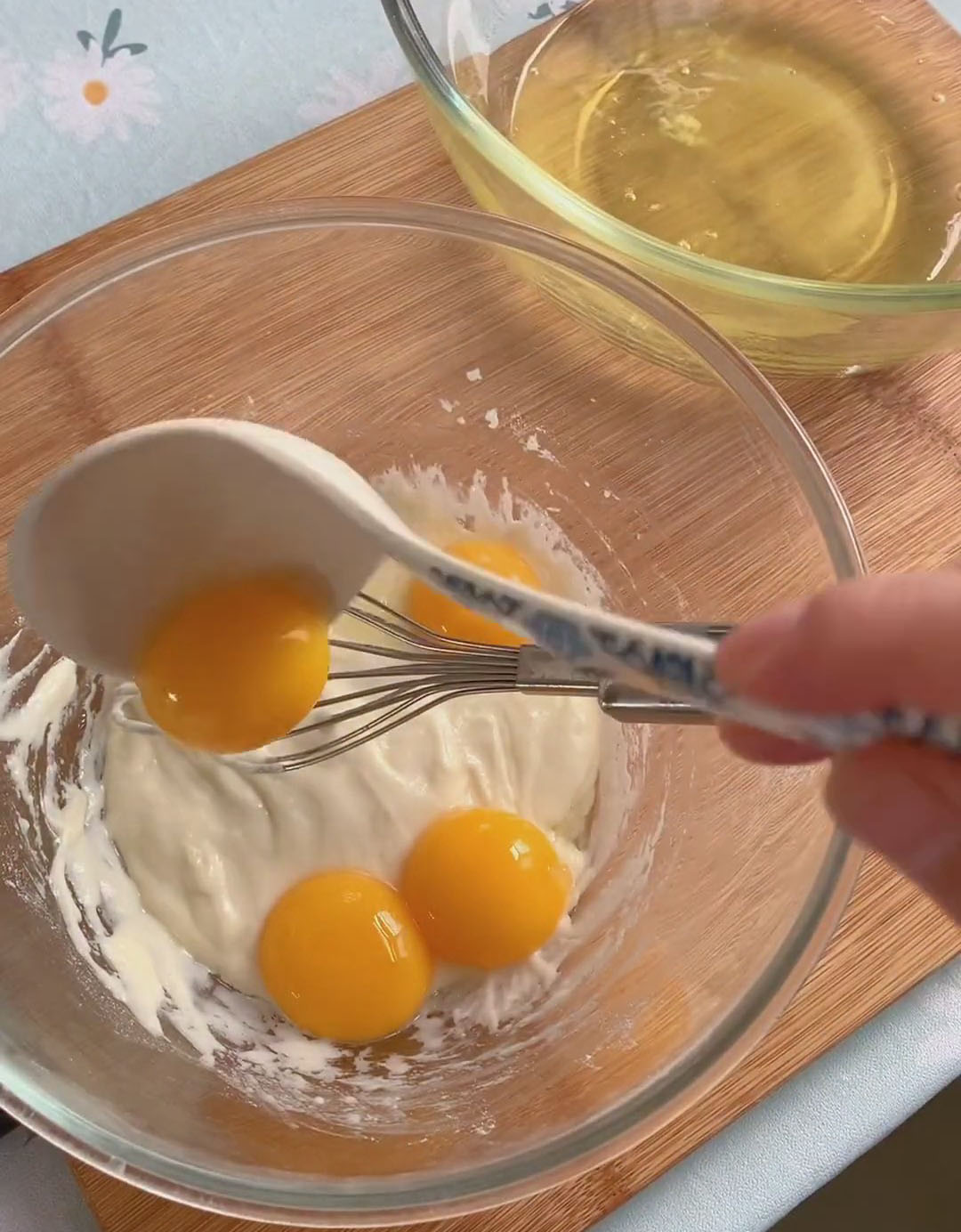 Add the 4 egg yolks to this flour mixture