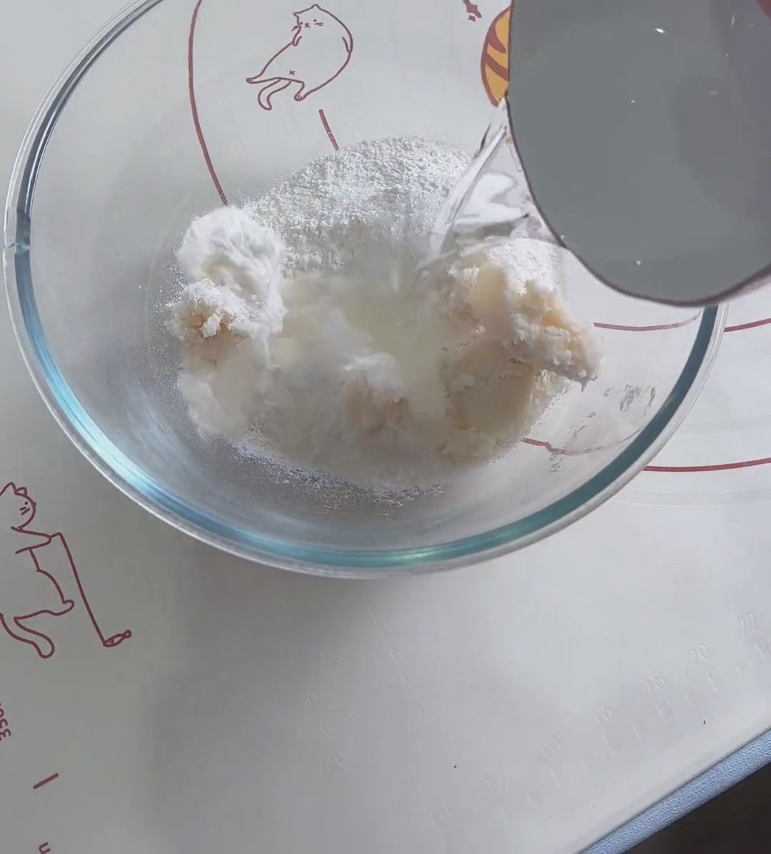 Add the lard and water