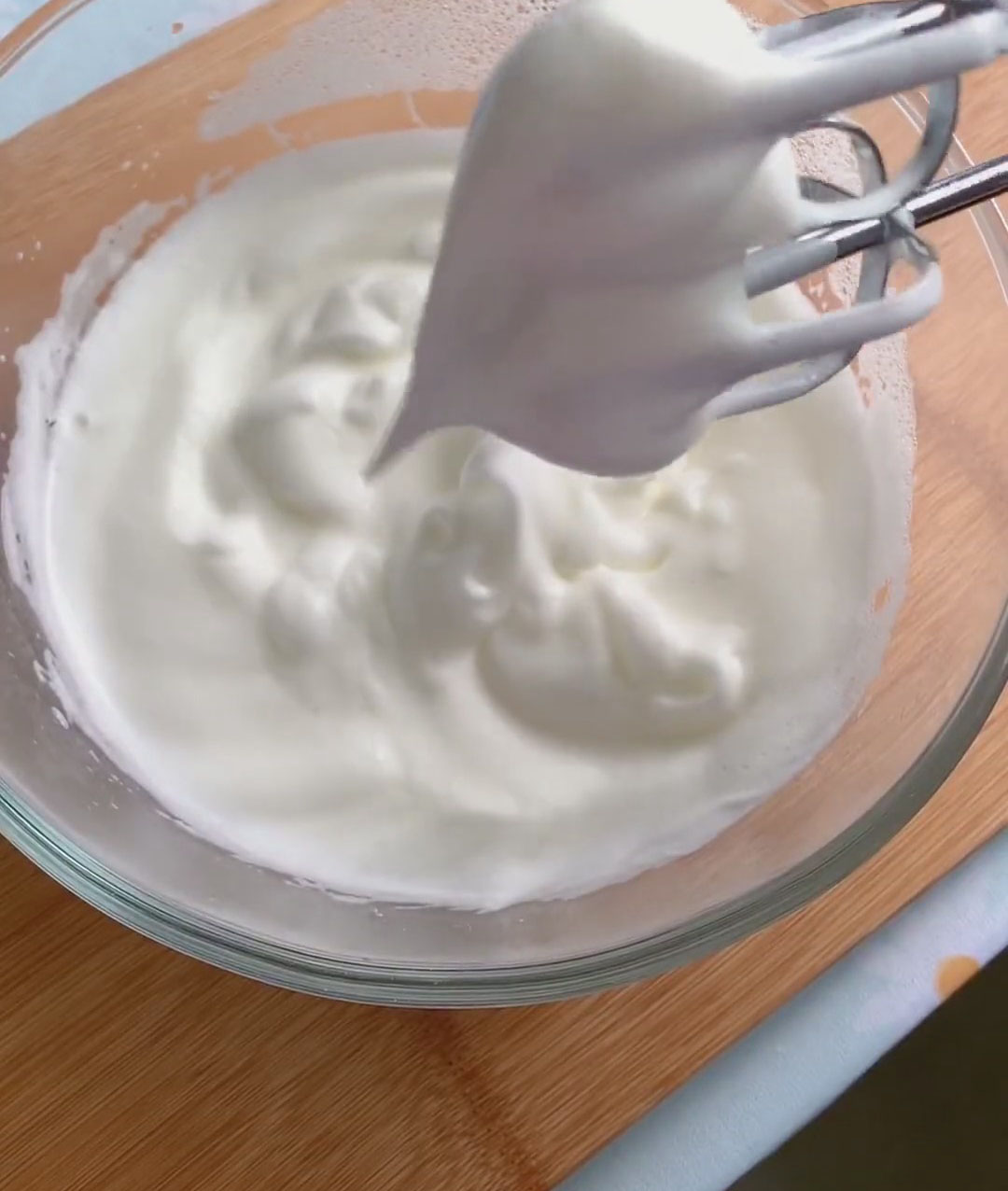 Continue whipping on medium high speed until the meringue reaches the soft peak stage