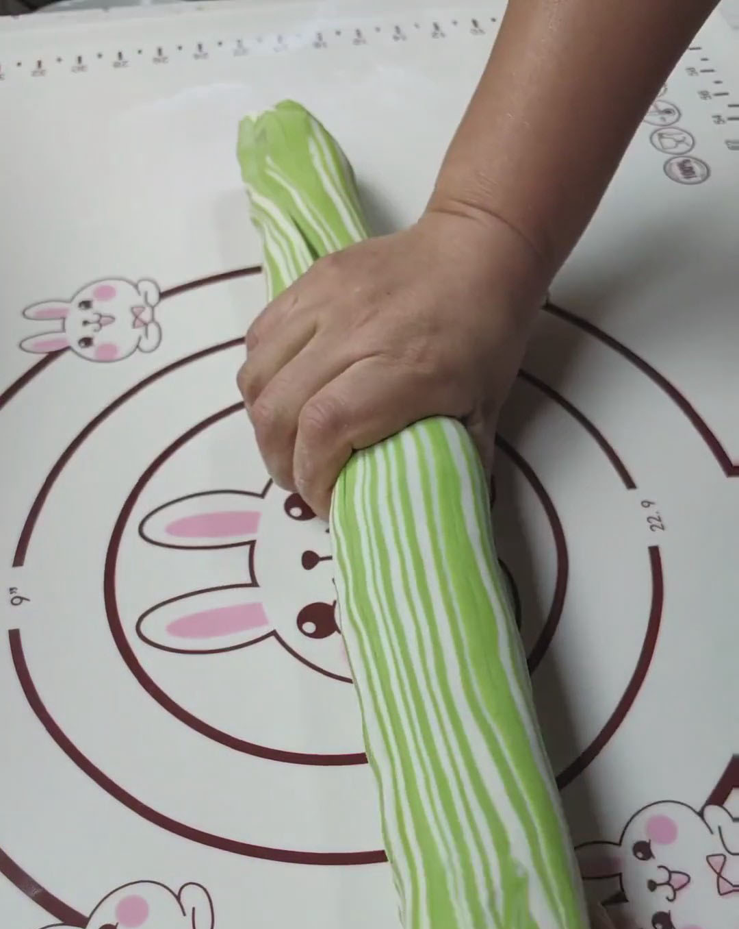 Gently roll the log into a long cylinder Gently roll the log into a long cylinder