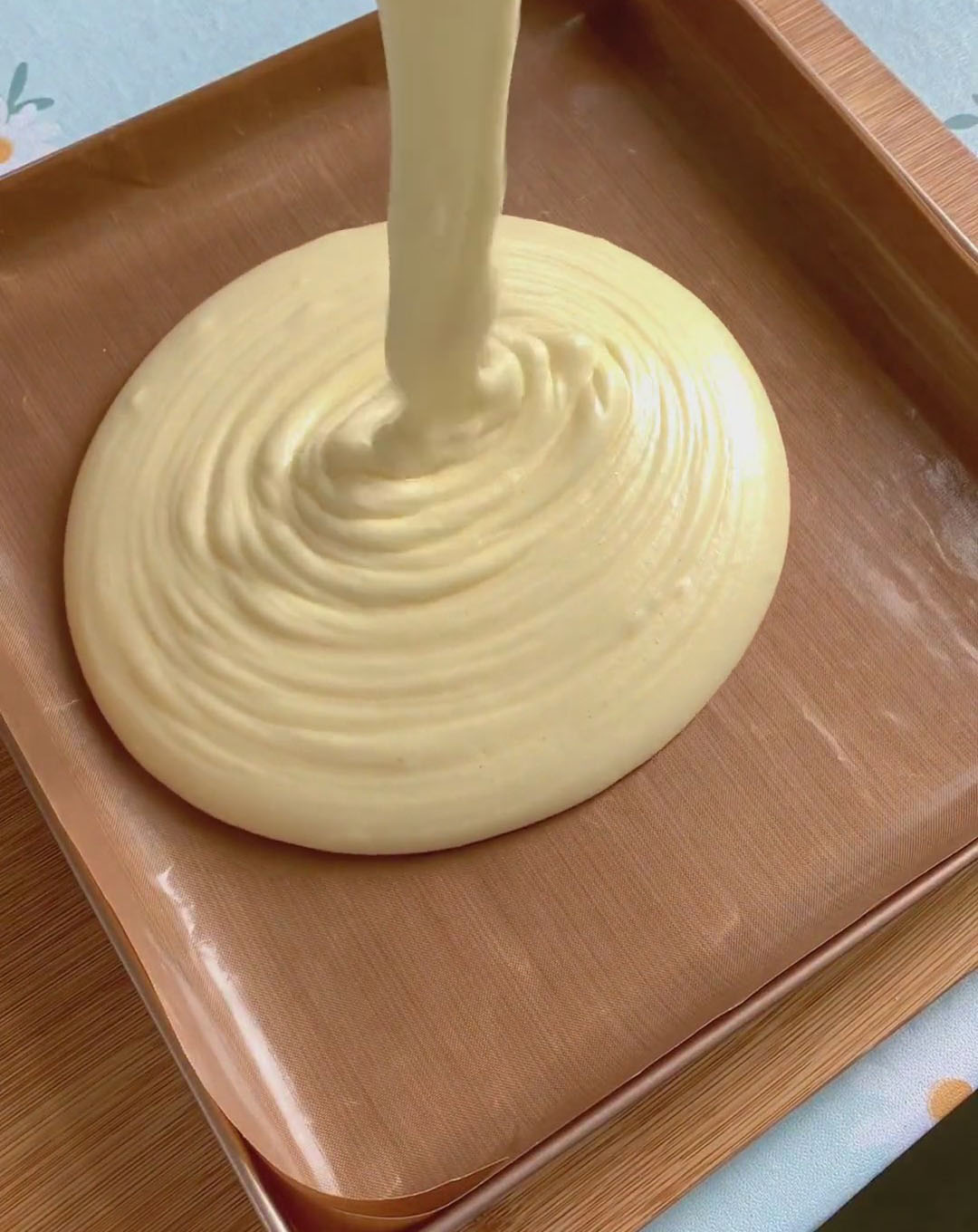 Pour the batter into the prepared baking tray