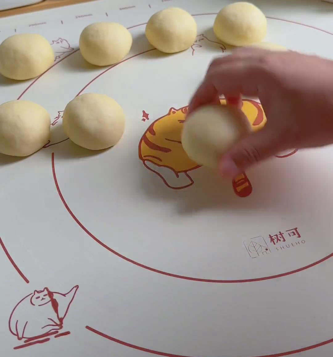 Roll each portion into a smooth ball Roll each portion into a smooth ball
