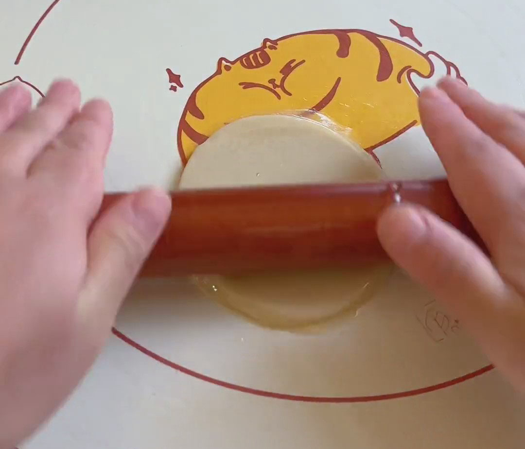 Roll the stacked wrappers into a large circle