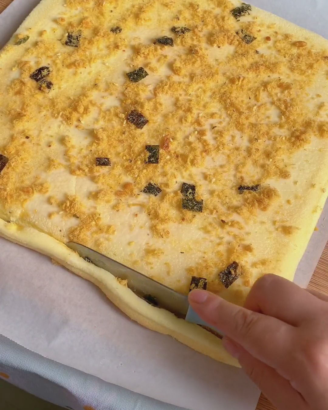 Trim the edges of the cake at an angle to make it easier to roll