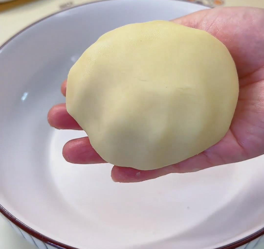 knead lightly until a smooth, non-sticky oil dough forms knead lightly until a smooth, non sticky oil dough forms