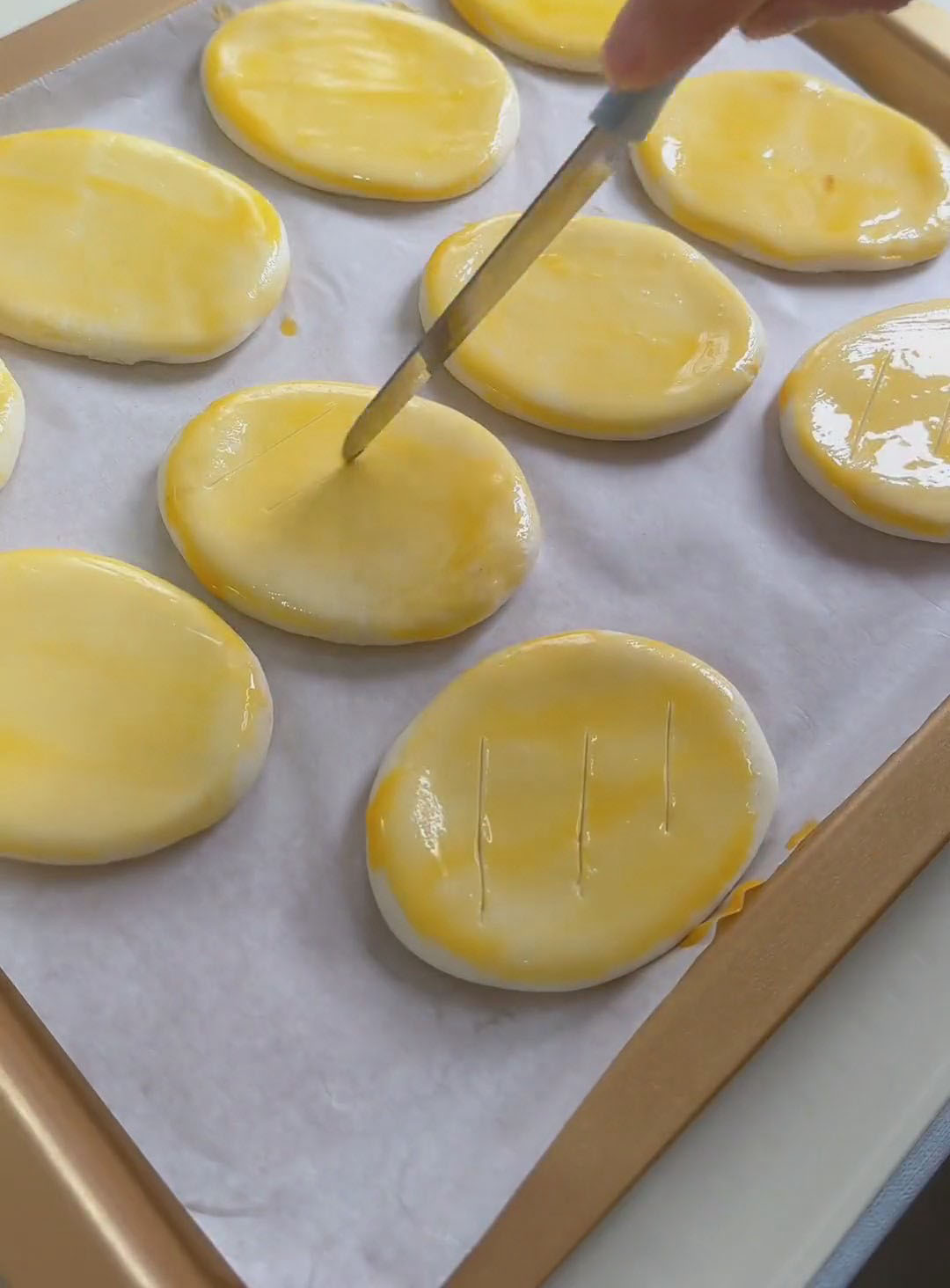 score three diagonal slashes on each with a small knife