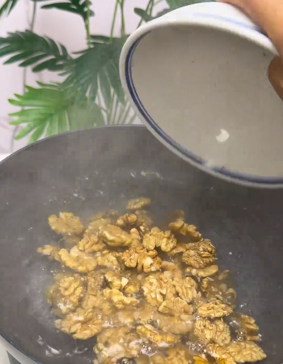 Add the walnut halves and baking soda Add the walnut halves and baking soda