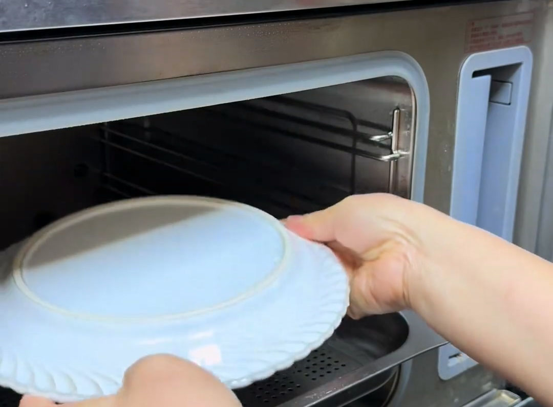 Cover the bowl with a plate