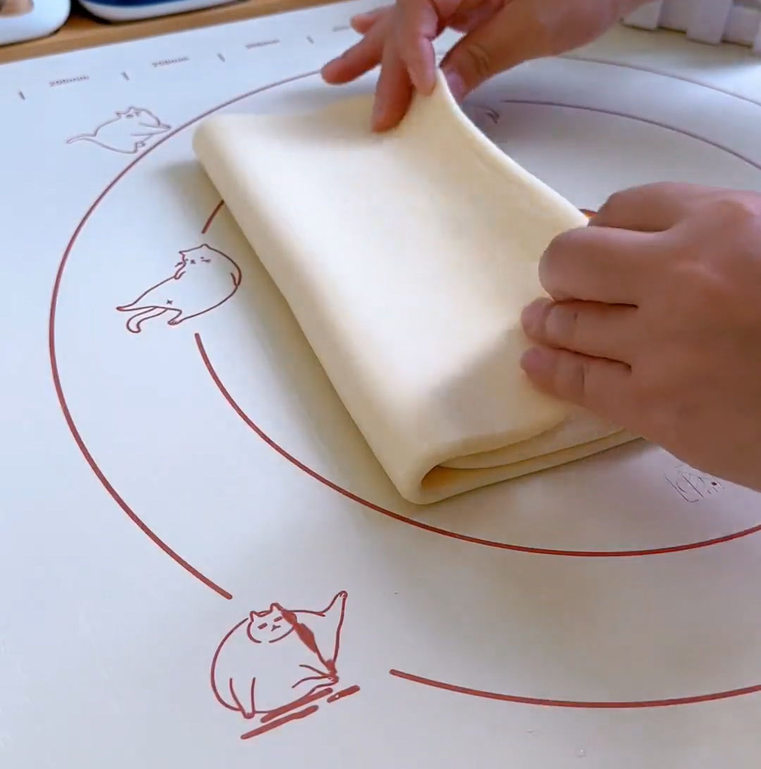 Fold both ends toward the centre2