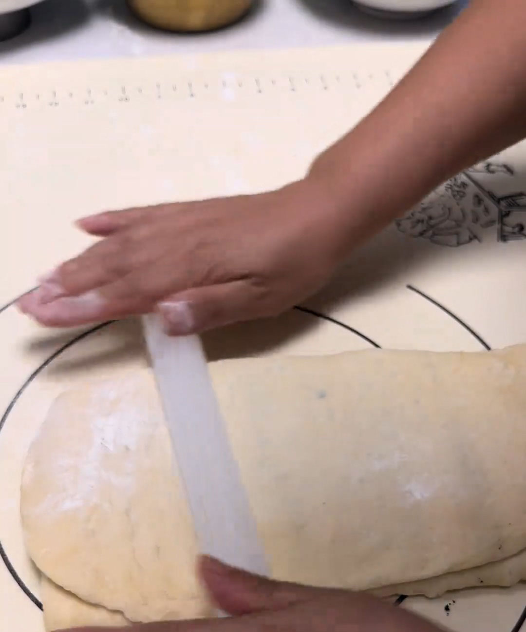Lightly roll the dough again