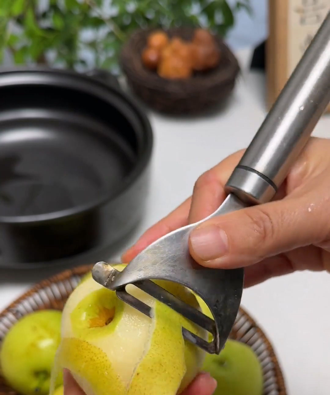 Peel the pears using a vegetable peeler