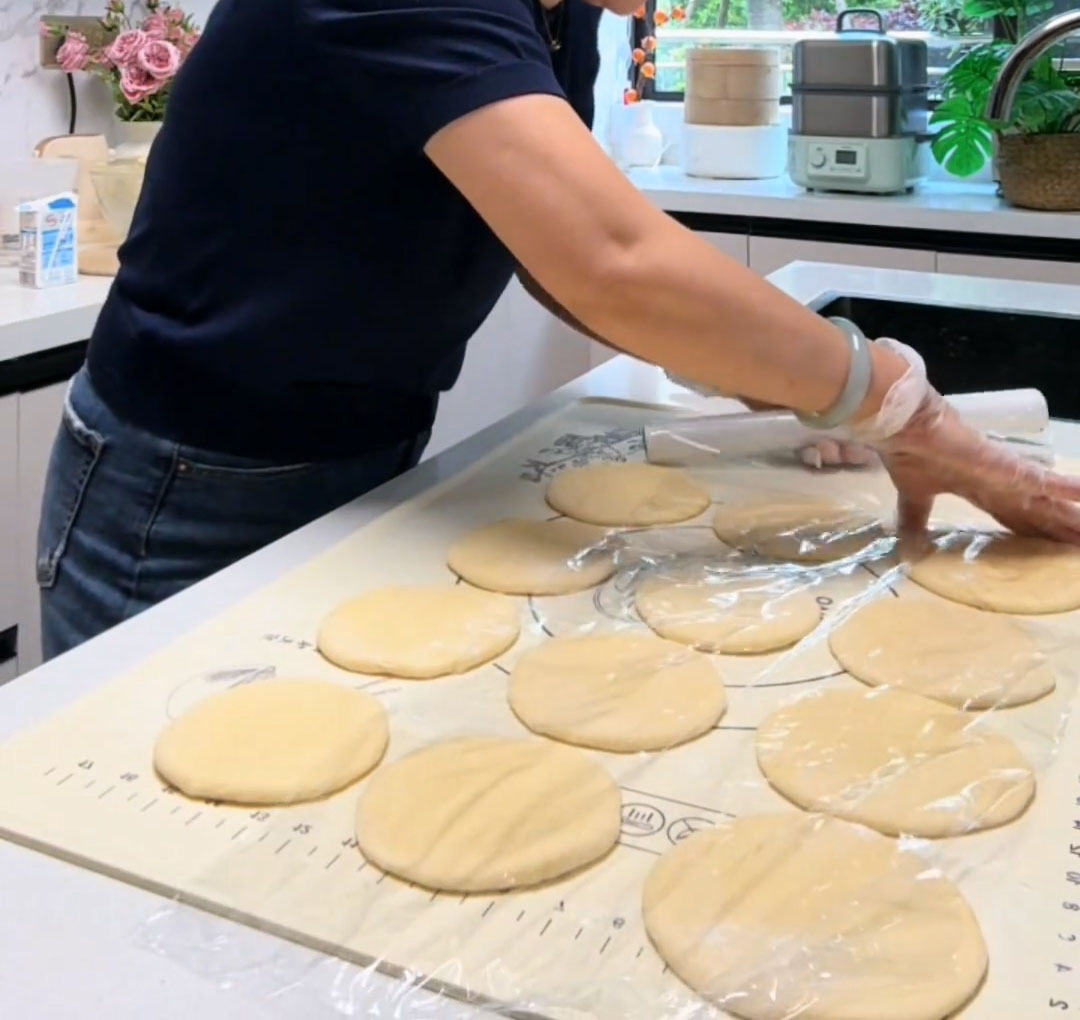 Place the shaped discs on a lightly floured surface Place the shaped discs on a lightly floured surface