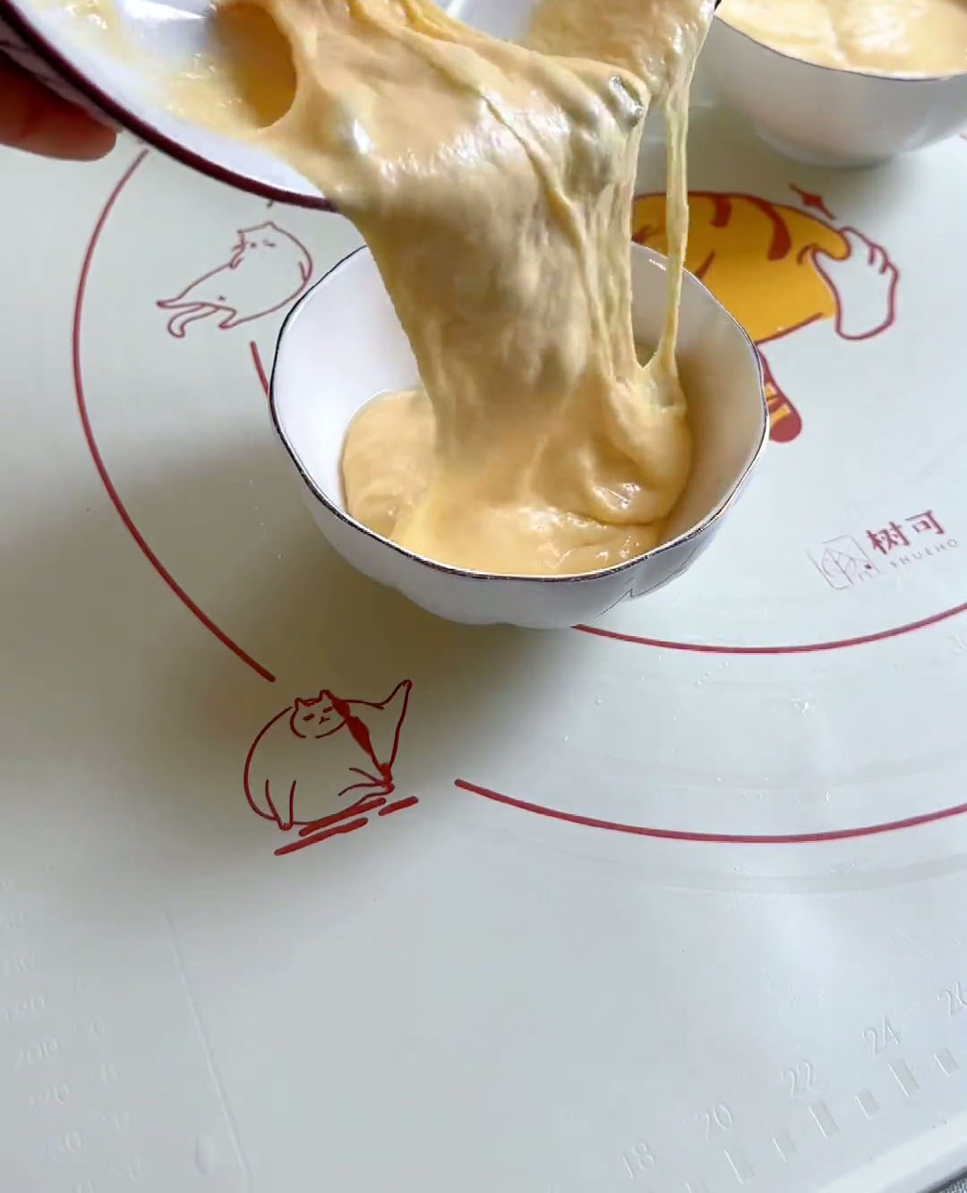 Pour batter into greased small bowls