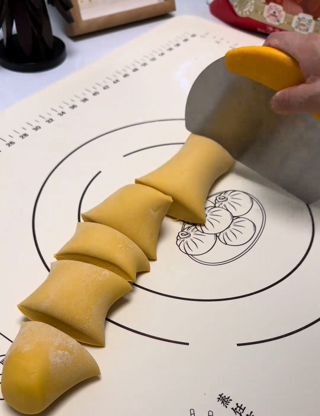 Roll the dough into a long log and divide it into 8 equal portions Roll the dough into a long log and divide it into 8 equal portions