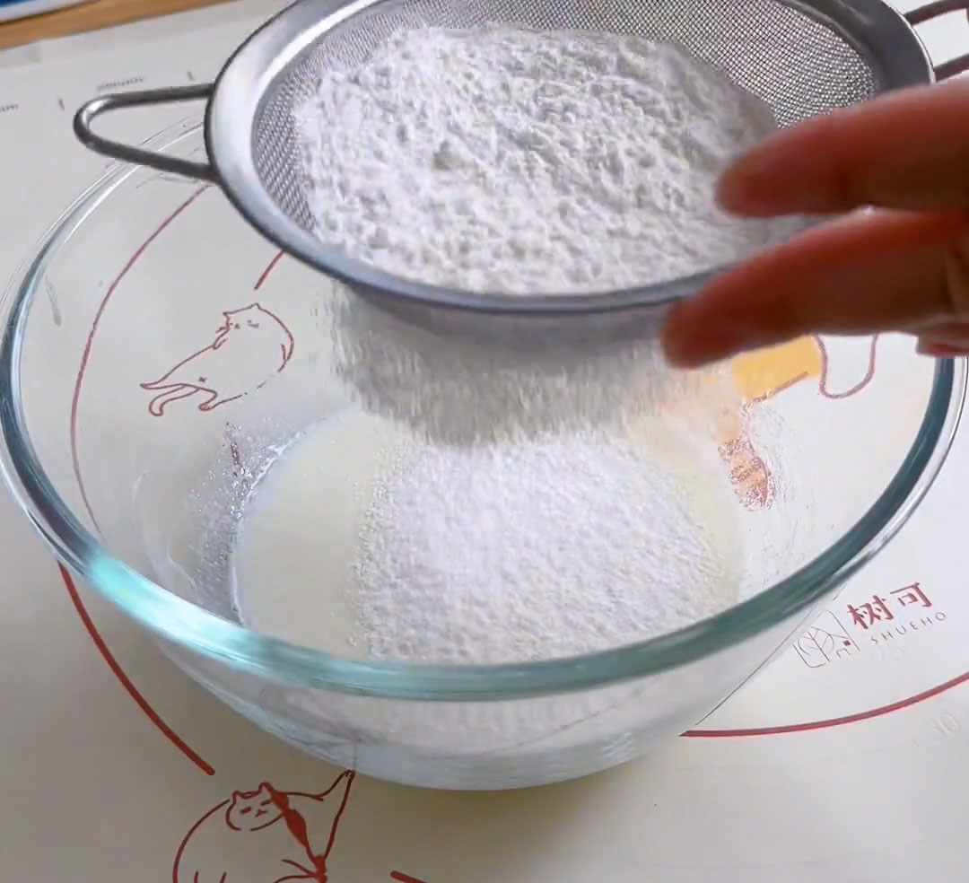 Sift the cake flour directly into the mixture