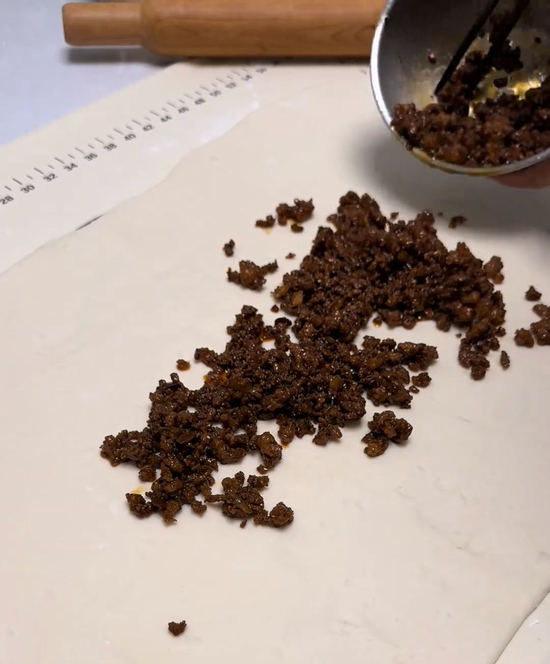 Spread the cooled pork filling evenly