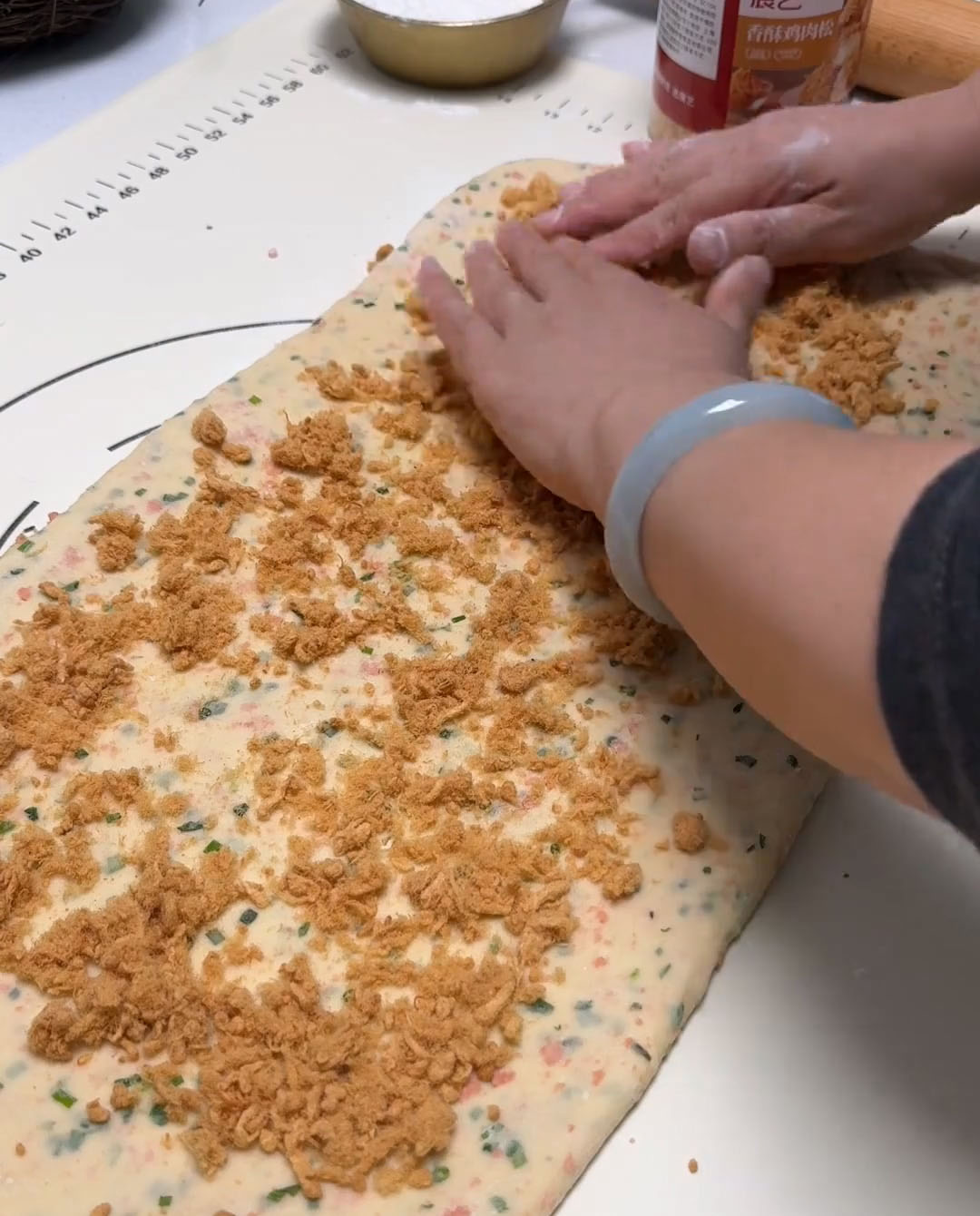 Sprinkle an even, generous layer of pork floss Sprinkle an even, generous layer of pork floss