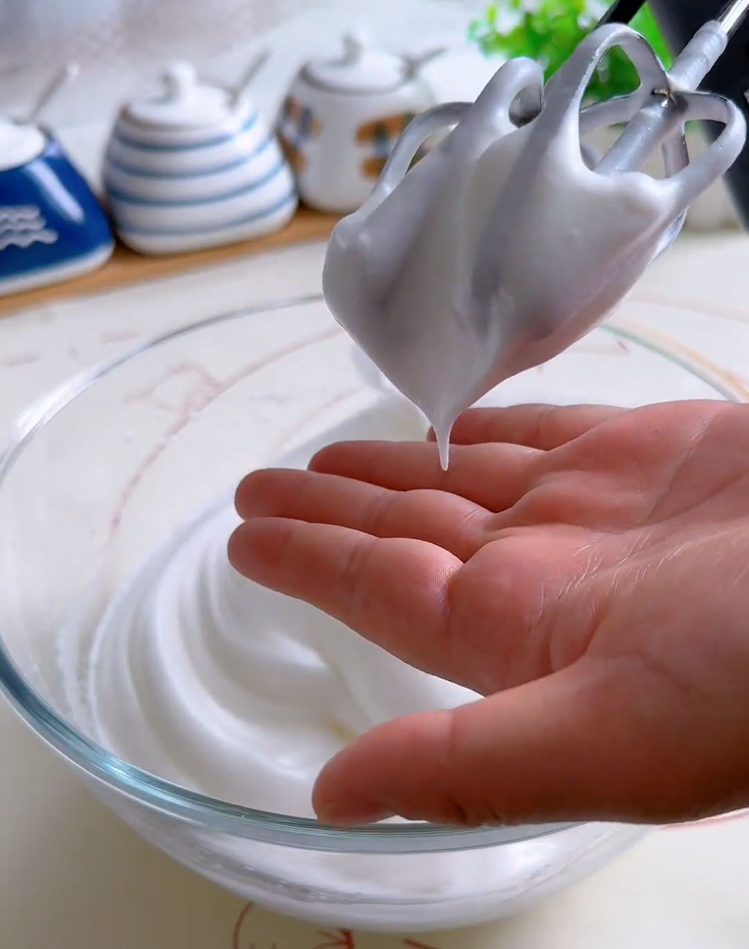 The meringue should form a large curved hook