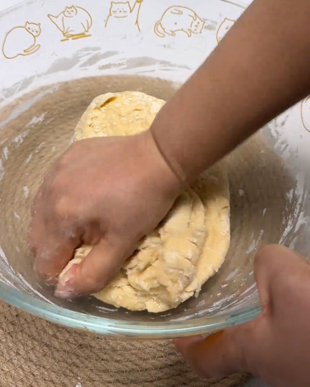 Use your hands to roughly incorporate the oil into the dough in the bowl until it's mostly absorbed Use your hands to roughly incorporate the oil into the dough in the bowl until it's mostly absorbed
